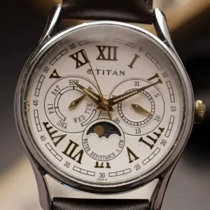 Titan Moonphase (Ref. 1487YAB) – White Dial Direct From Factory